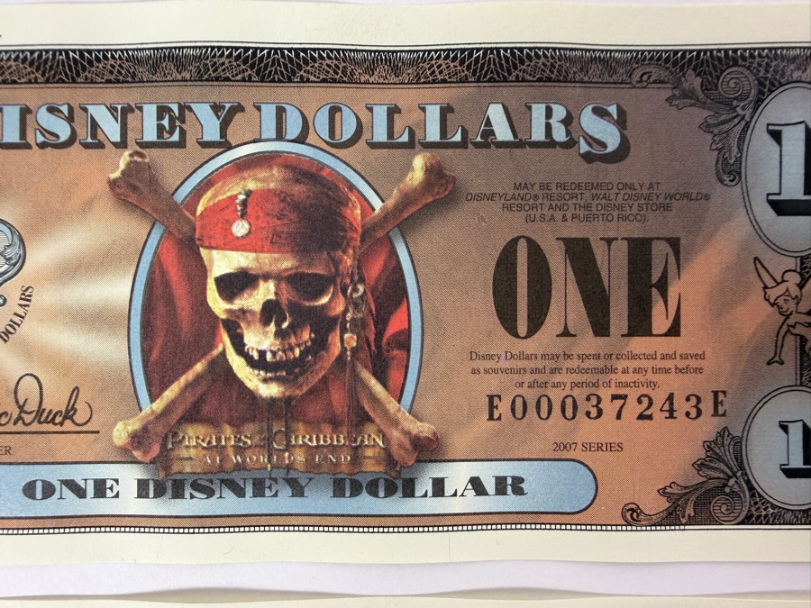 (2) 2007 Series $1 Disney Dollars Pirates of the Caribbean: At World's End Skull Design In Mint Uncirculated Condition Consecutive Serial Numbers E00037243E / E00037244E [Photo 2]