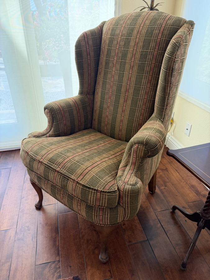 Traditional Queen Anne Style Upholstered Wingback Armchair Featuring Earth Tone Plaid Stripe Fabric And Carved Cabriole Legs 30'W X 32'D X 46'H [Photo 2]