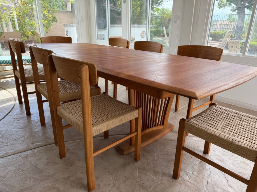 Teak Dining Table with One Leaf and (8) Dining Chairs by Sun Cabinet Co. 41.25'D X 102'L (Leaf Measures 23.75'L) Table w/o Leaf is 78.25'L [Photo 11]