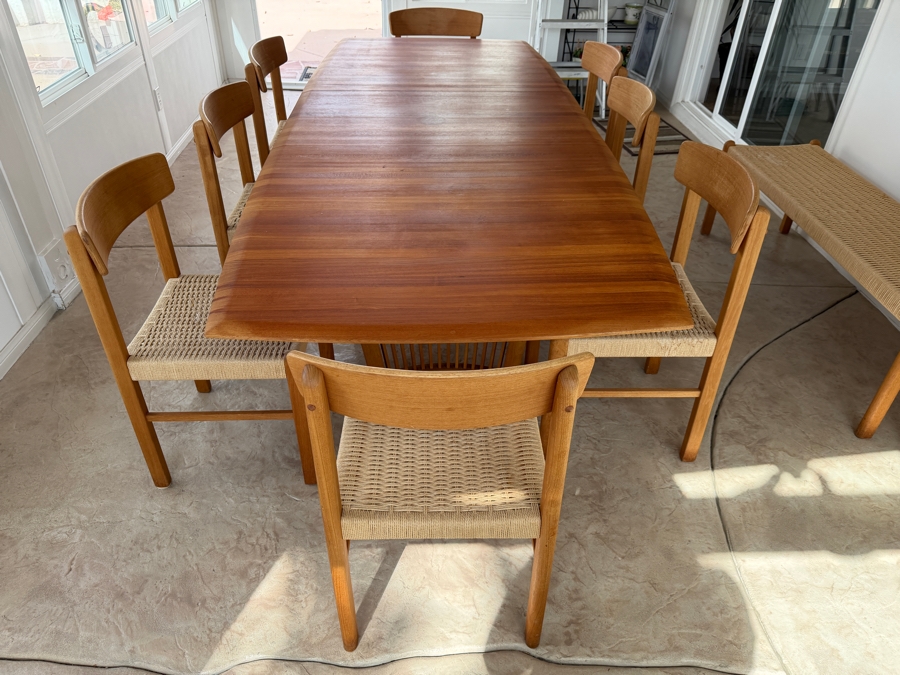 Teak Dining Table with One Leaf and (8) Dining Chairs by Sun Cabinet Co. 41.25'D X 102'L (Leaf Measures 23.75'L) Table w/o Leaf is 78.25'L [Photo 7]