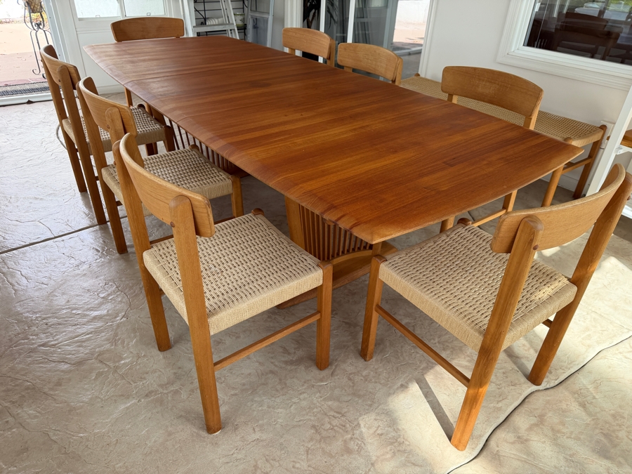 Teak Dining Table with One Leaf and (8) Dining Chairs by Sun Cabinet Co. 41.25'D X 102'L (Leaf Measures 23.75'L) Table w/o Leaf is 78.25'L [Photo 14]
