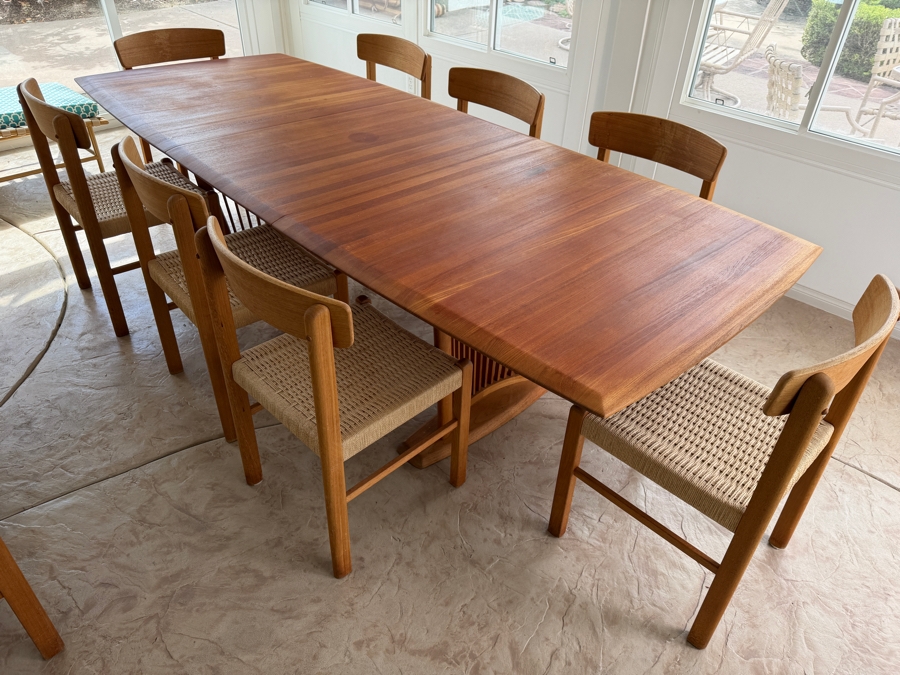 Teak Dining Table with One Leaf and (8) Dining Chairs by Sun Cabinet Co. 41.25'D X 102'L (Leaf Measures 23.75'L) Table w/o Leaf is 78.25'L [Photo 10]