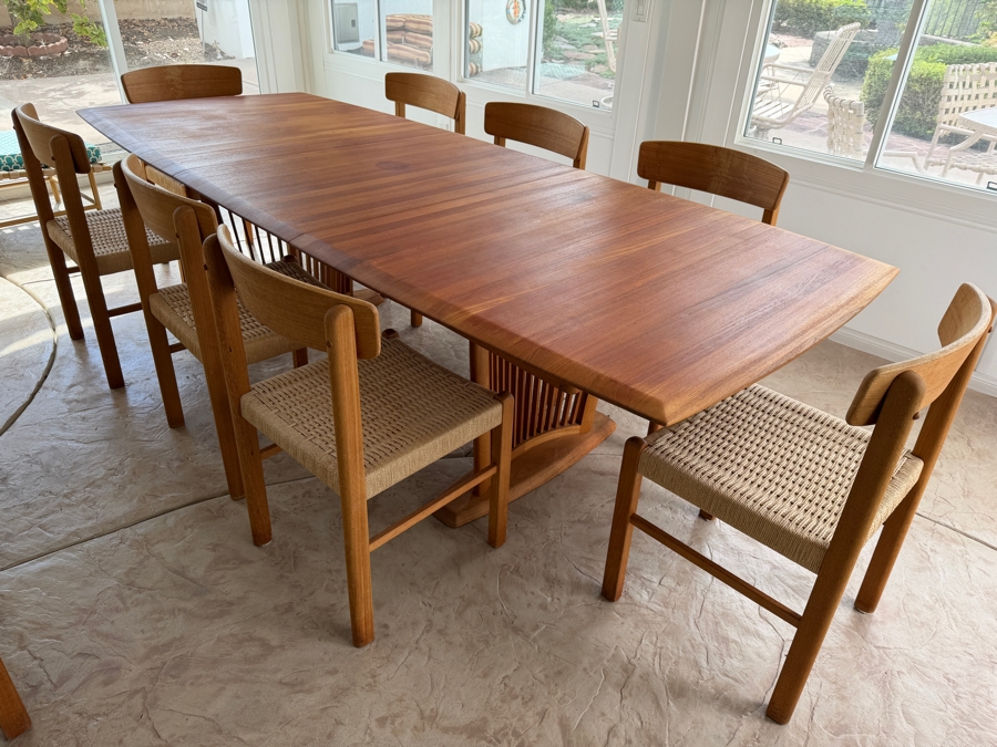 Teak Dining Table with One Leaf and (8) Dining Chairs by Sun Cabinet Co. 41.25'D X 102'L (Leaf Measures 23.75'L) Table w/o Leaf is 78.25'L [Photo 9]