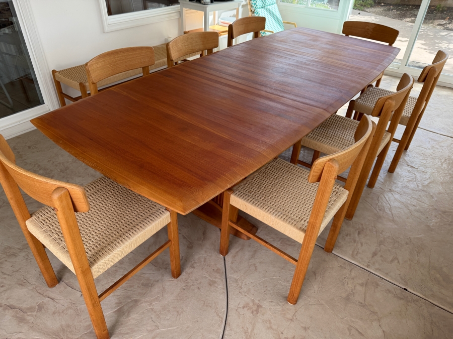 Teak Dining Table with One Leaf and (8) Dining Chairs by Sun Cabinet Co. 41.25'D X 102'L (Leaf Measures 23.75'L) Table w/o Leaf is 78.25'L [Photo 5]