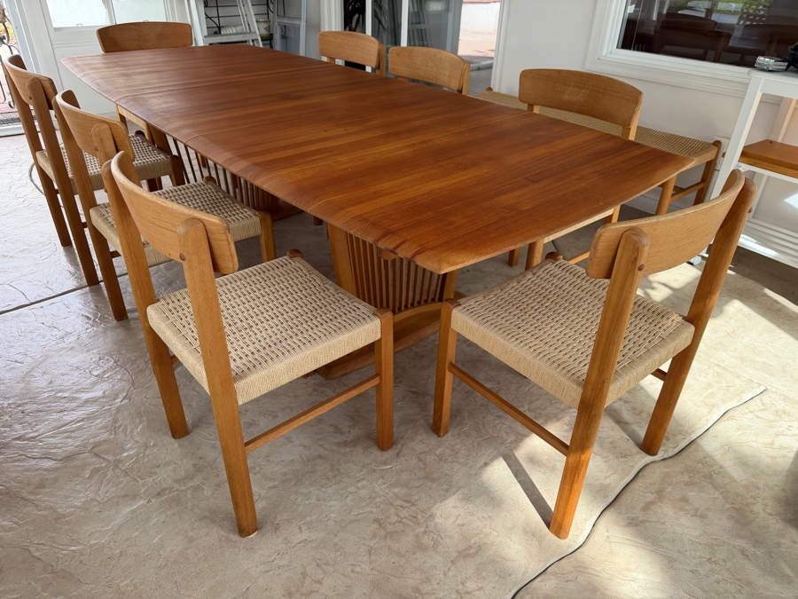 Teak Dining Table with One Leaf and (8) Dining Chairs by Sun Cabinet Co. 41.25'D X 102'L (Leaf Measures 23.75'L) Table w/o Leaf is 78.25'L [Photo 13]
