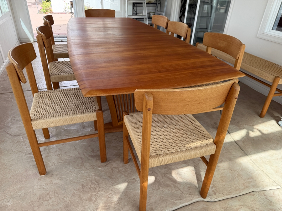 Teak Dining Table with One Leaf and (8) Dining Chairs by Sun Cabinet Co. 41.25'D X 102'L (Leaf Measures 23.75'L) Table w/o Leaf is 78.25'L [Photo 12]
