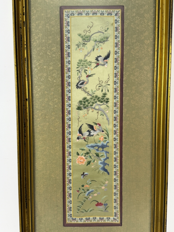 Late Qing Dynasty Chinese Embroidered Celadon Silk Robe Band Panel Featuring Cranes Pine Trees And Peonies 5.5W X 20H Gilt Framed 14.5W X 29.5H