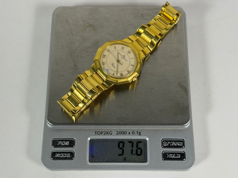 18K Solid Yellow Gold Men's Baume & Mercier Riviera Ref 87012 9 34mm Watch White Roman Numeral Dial Quartz Movement With Box 97.6g Estimate $9,500 to $12,500 [Photo 13]
