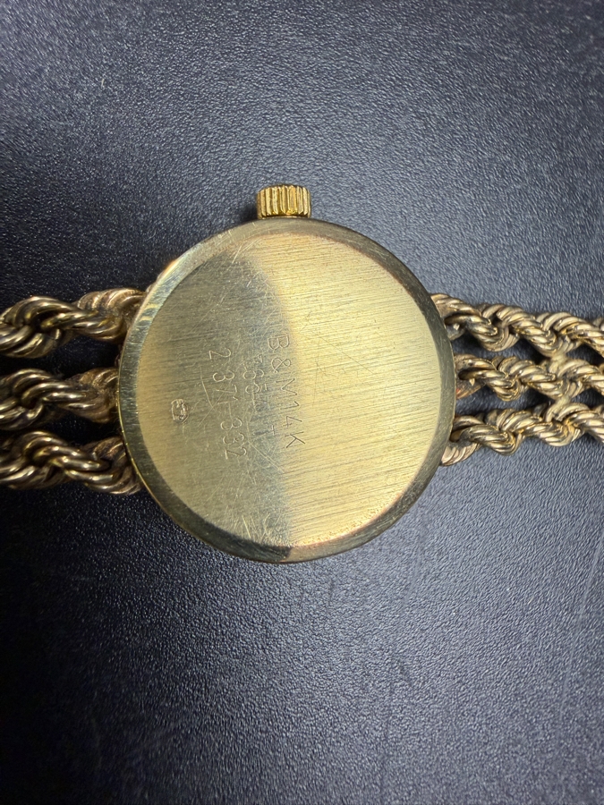 Vintage Baume And Mercier Ladies Geneve 14K Yellow Gold Women's Quartz Rope Bracelet Watch, Reference 7654 T With Box 21.1g Estimate $1,500 - $3,500 [Photo 5]