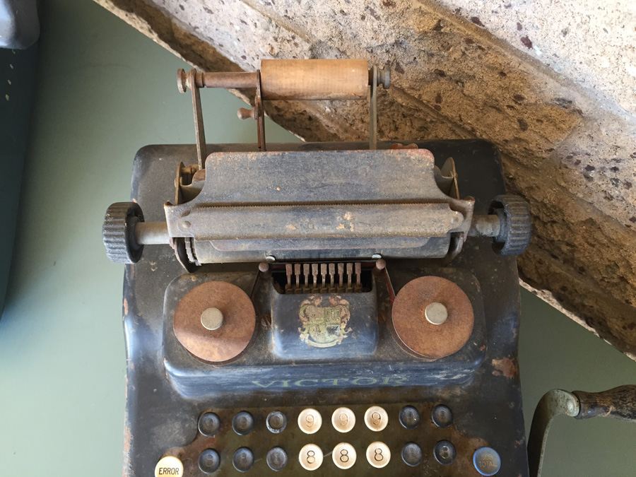Vintage victor and marchant adding machines