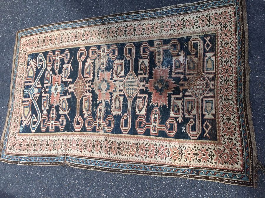 Handmade Wool Area Rug [Photo 1]