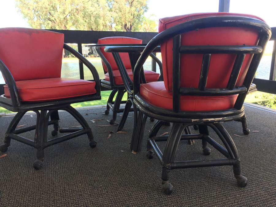 Outdoor Black Rattan Glass Top Table With Four Chairs On Casters [Photo 4]