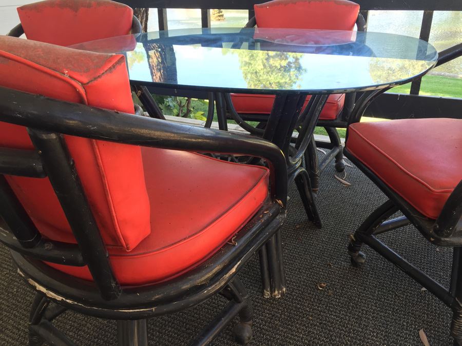 Outdoor Black Rattan Glass Top Table With Four Chairs On Casters [Photo 5]