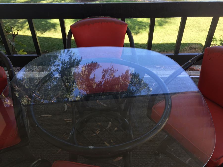 Outdoor Black Rattan Glass Top Table With Four Chairs On Casters [Photo 10]