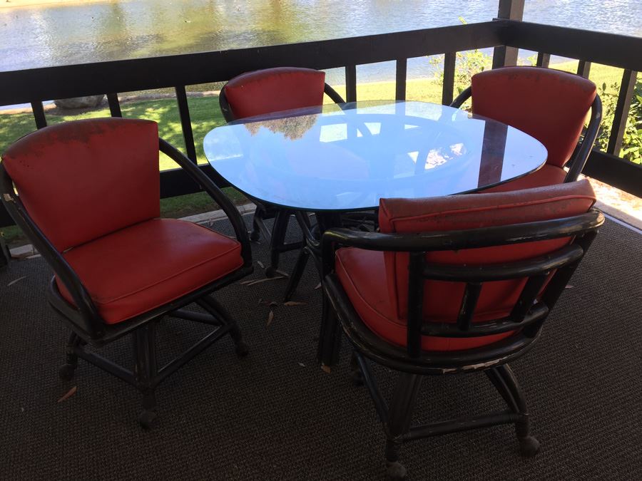 Outdoor Black Rattan Glass Top Table With Four Chairs On Casters [Photo 3]